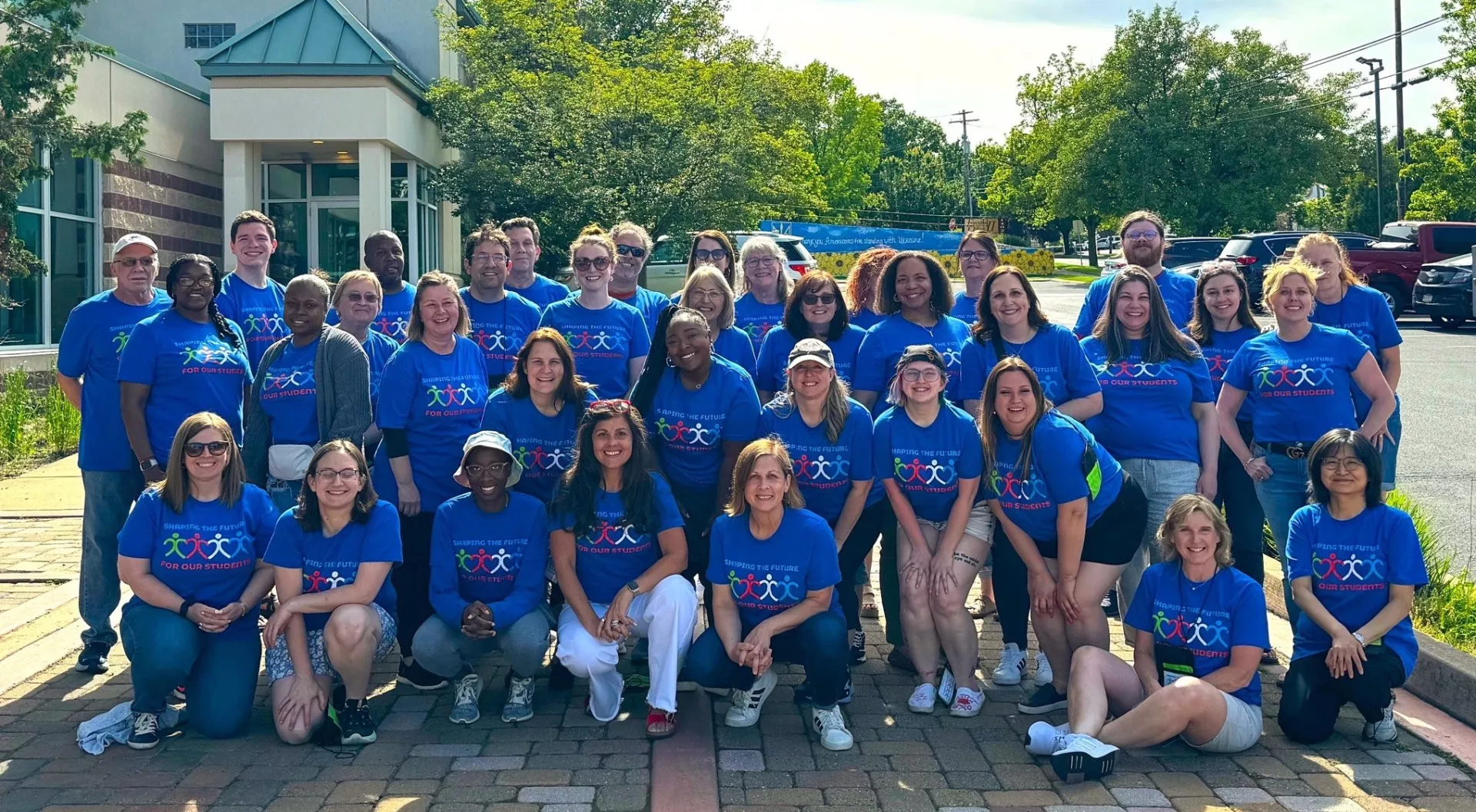 PSEA members in For Our Students shirts pose
