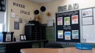 photos of black mailboxes in the corner of a second-grade classroom