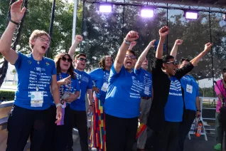 The NEA Executive Committee raises their fists in the air at the 2023 Freedom to Learn Rally in Orlando
