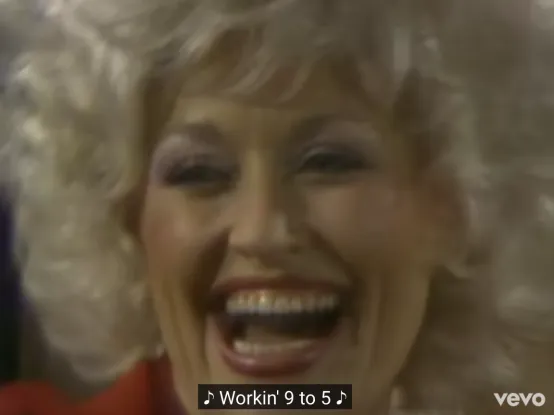 Photo of Dolly Parton singing "9 to 5"